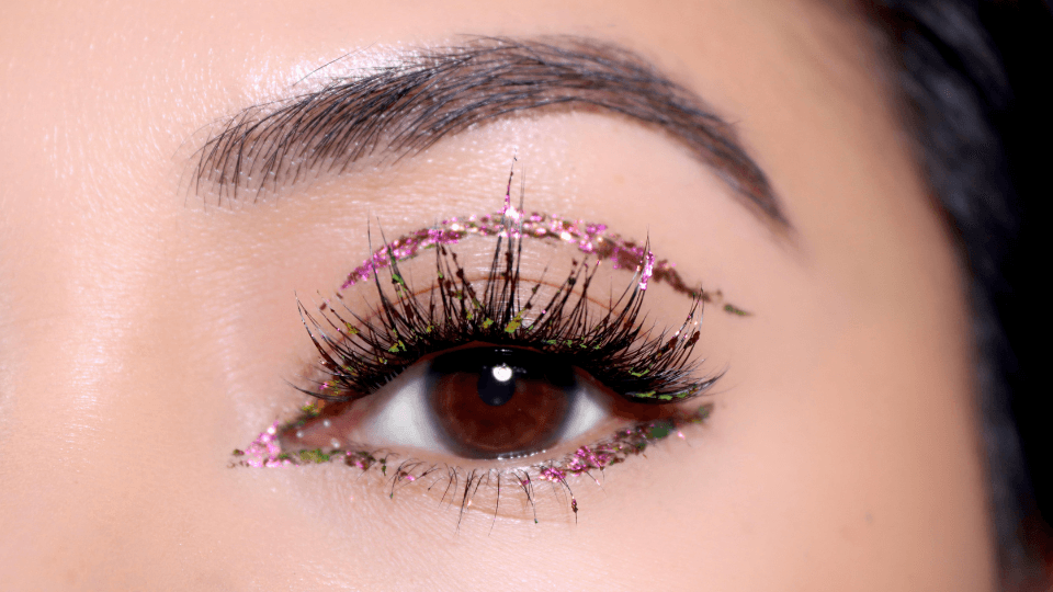 Spiky Stardust Gossamer® lash map with glitter eyeshadow for a festive New Year's Eve look