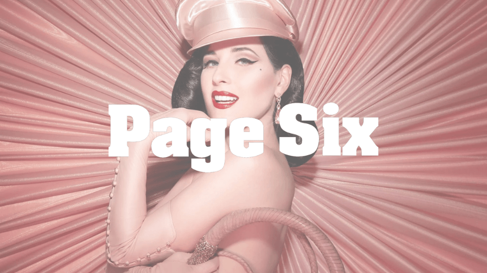 Dita Von Teese in classic pinup glamour with dramatic winged eyes and full lashes