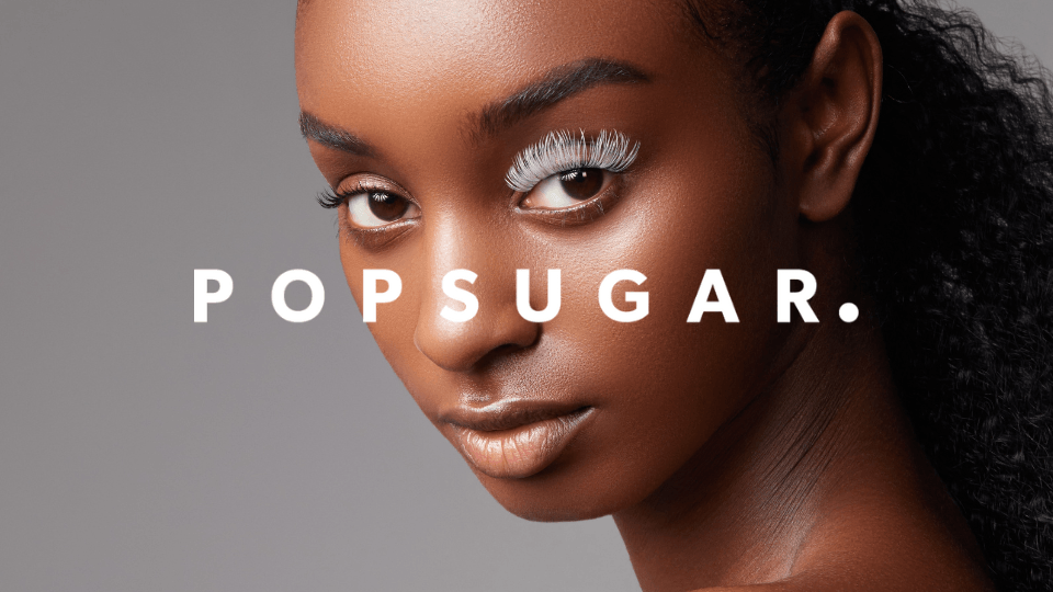 Model wearing white eyelash extensions for a dreamy, ethereal makeup trend