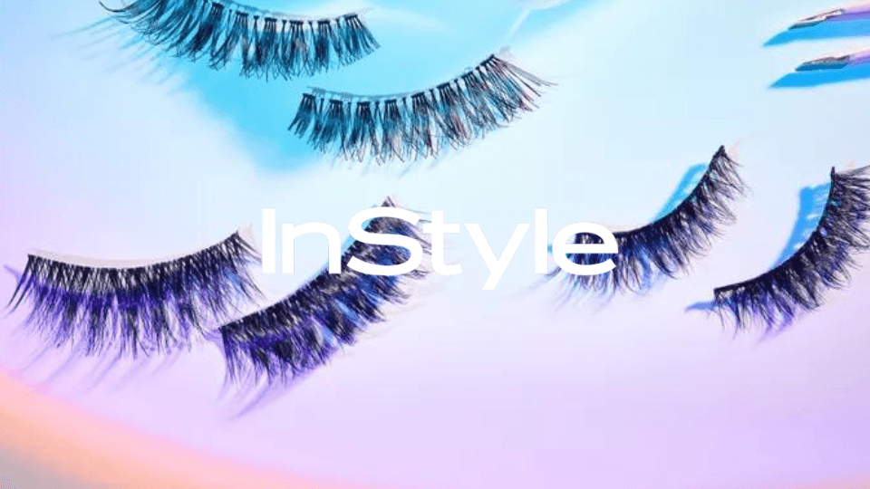 Assortment of tested false eyelashes including Lashify Gossamer® lashes on a white surface
